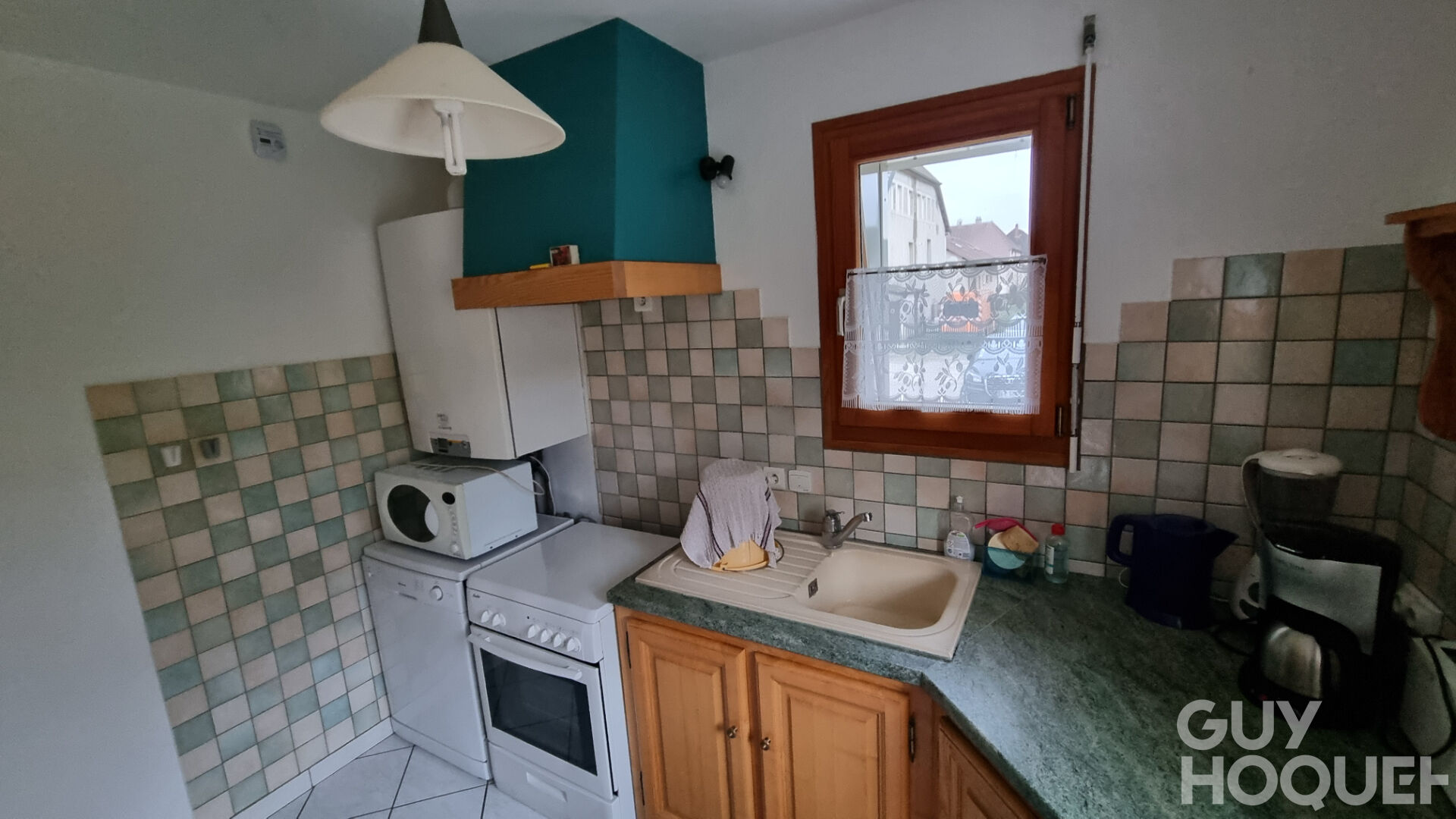 APPARTEMENT AVEC TERRASSE ET GARAGE