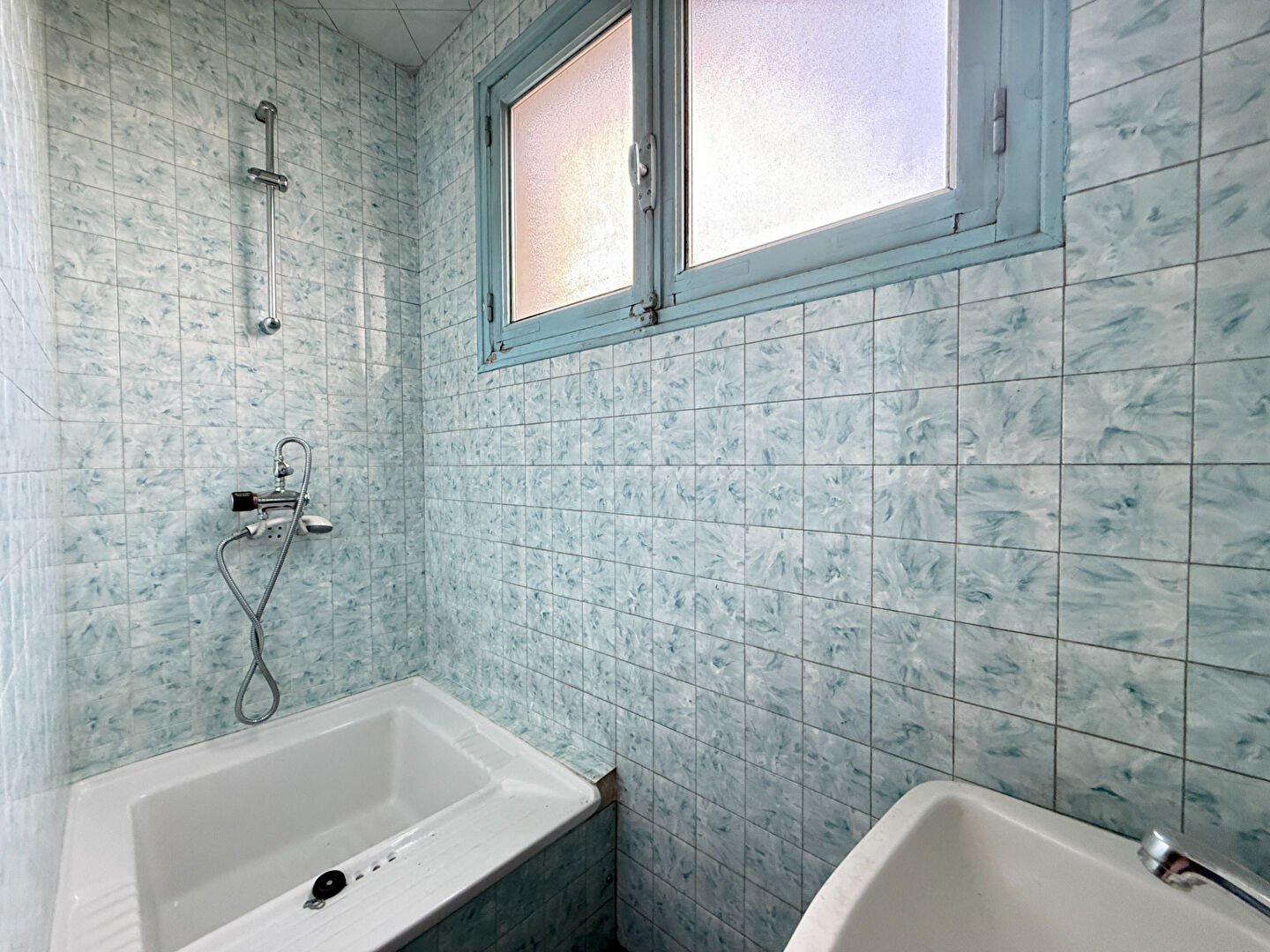 Maison à rénover quartier Sainte-Anne avec garage double et jardin