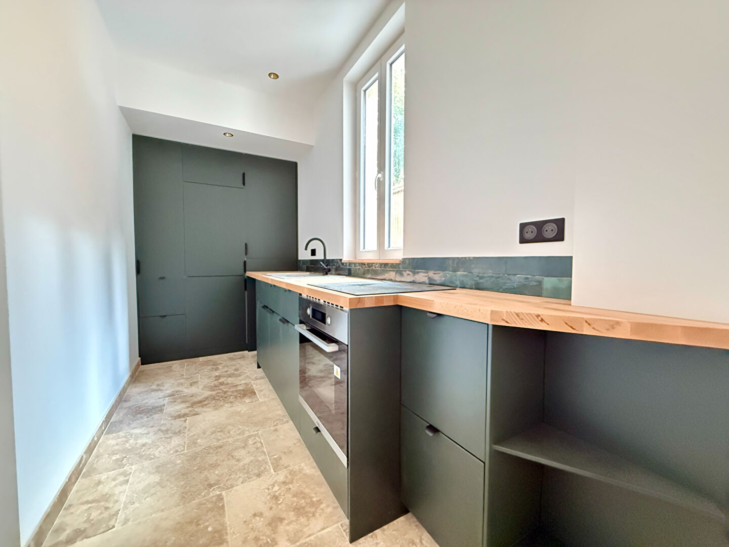 Maison avec extérieur et garage proche centre ville