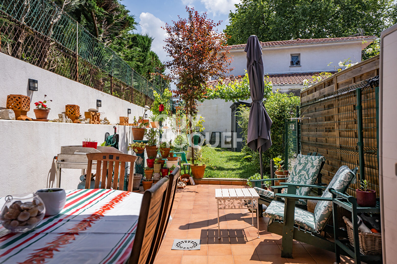 Centre ville -Grand duplex avec terrasses et jardin