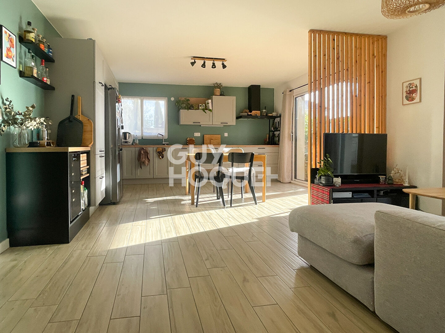 À VENDRE  Appartement de plain-pied avec jardin  Centre de Luzinay