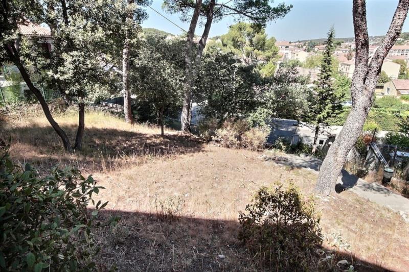 Terrain de 380 m² non viabilisé avec viabilités en bordure + garage