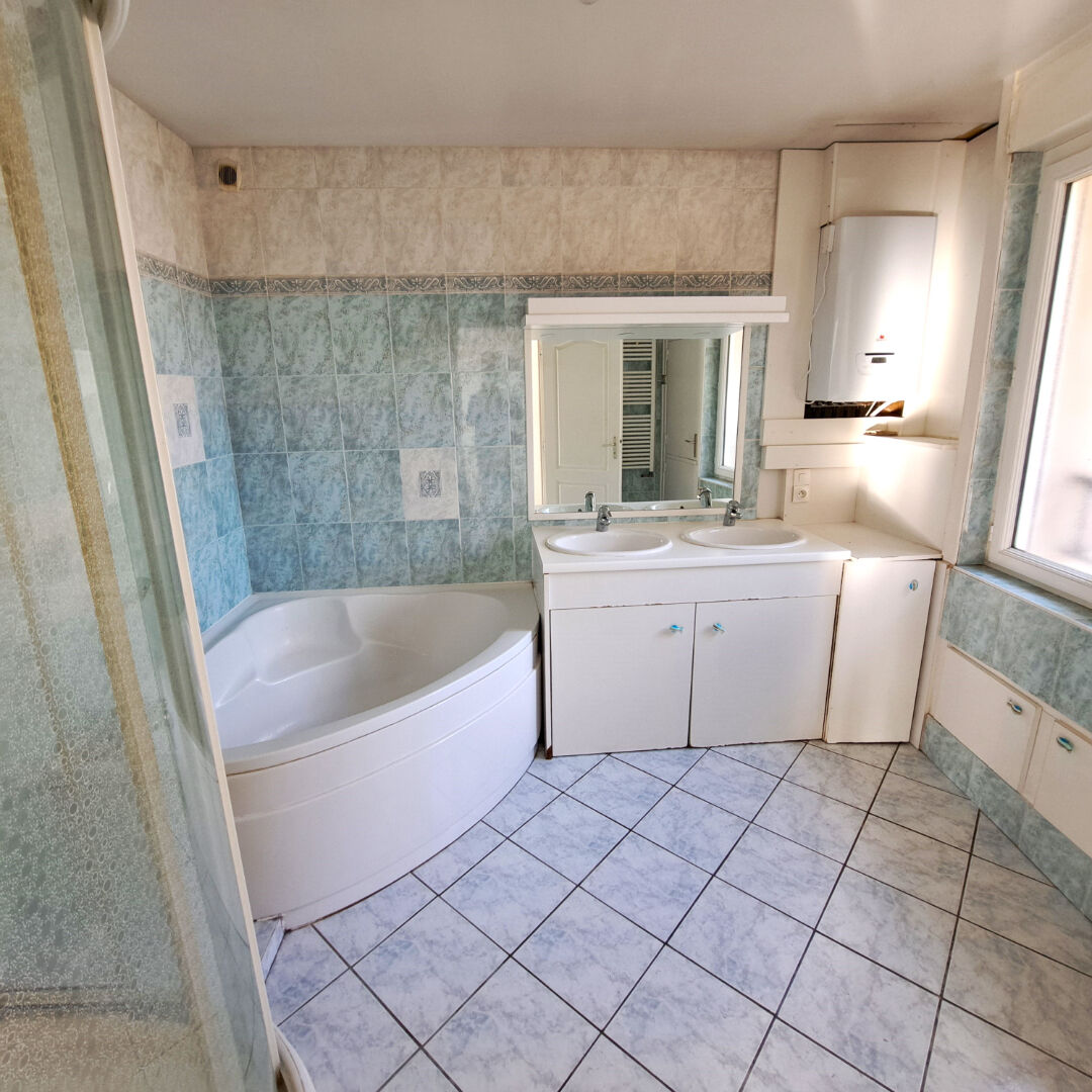 Rez de jardin de 125m², 4 chambres, à St Genis laval centre