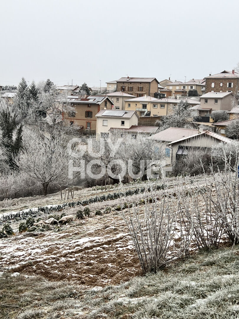 Terrain de 1574 m² à Saint Martin en Haut centre