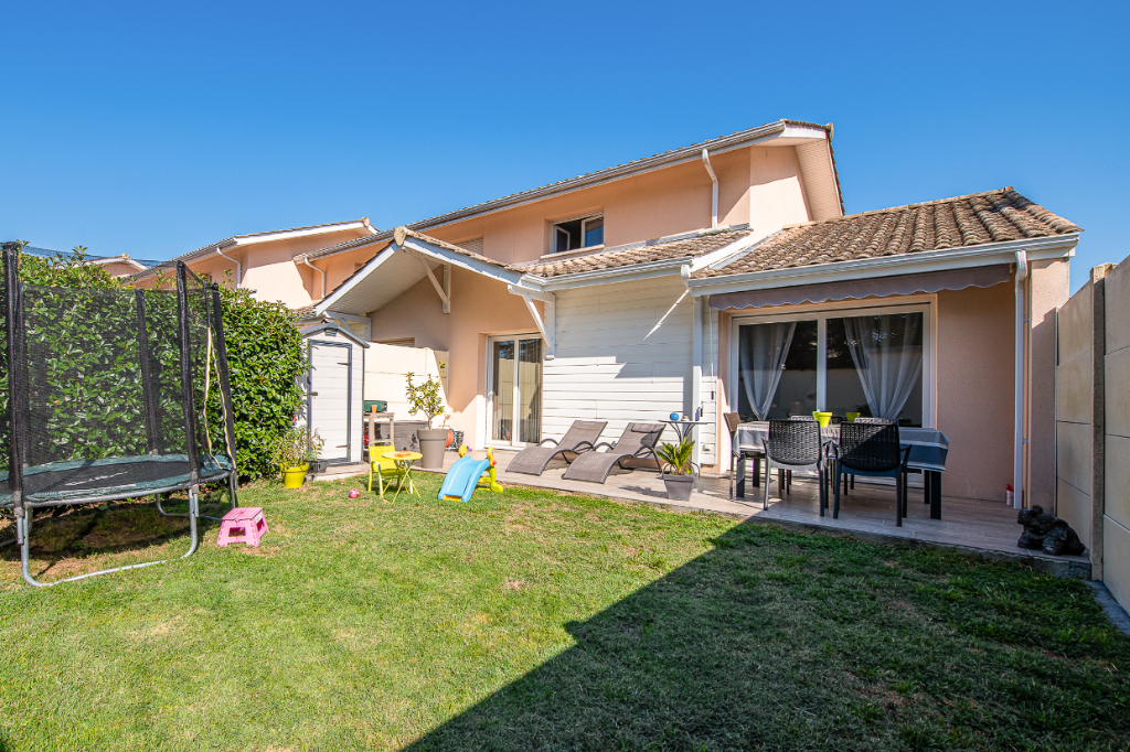 Maison mitoyenne avec garage