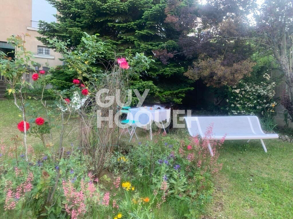 RARE: appartement de caractère avec trois chambres un jardin et un garage à NANCY BOUDONVILLE