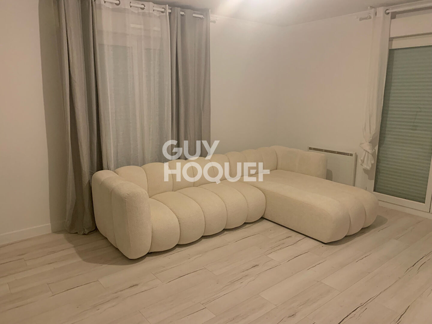 T3 de 70 m² avec balcon, parking et locataire en place ? 