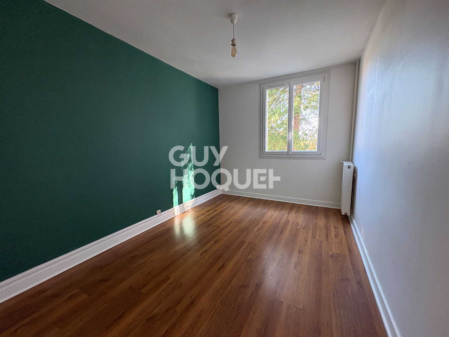 Appartement 3 pièces avec balcon, cave et place de parking