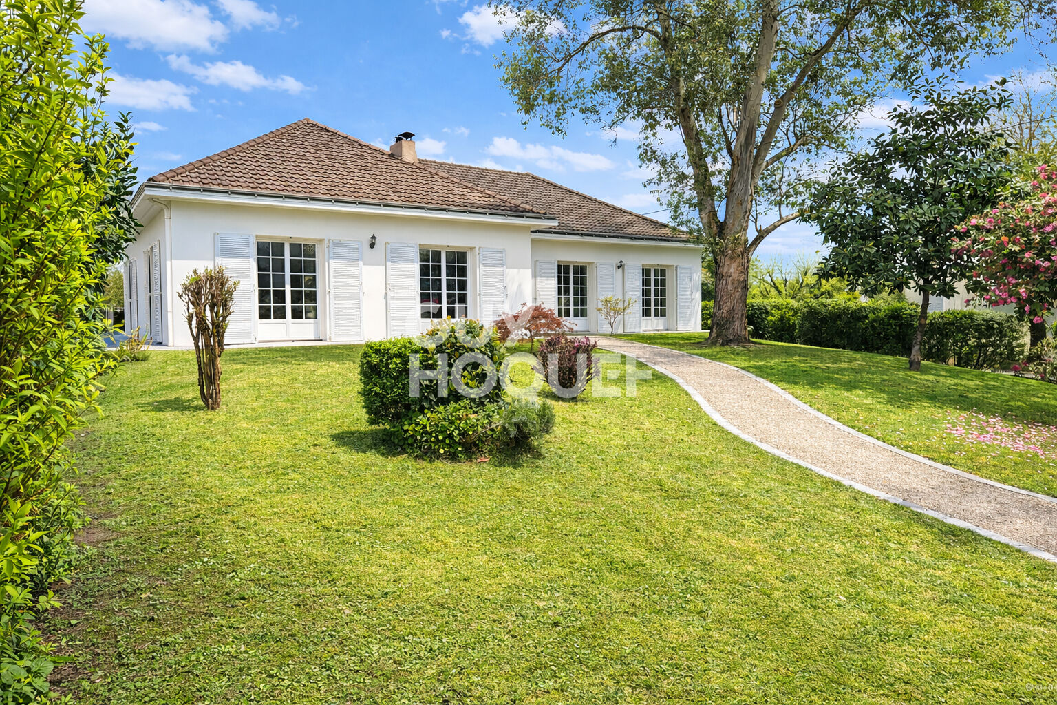 Maison familiale 142 m² à Basse-Goulaine - Jardin et terrasse avec pergola