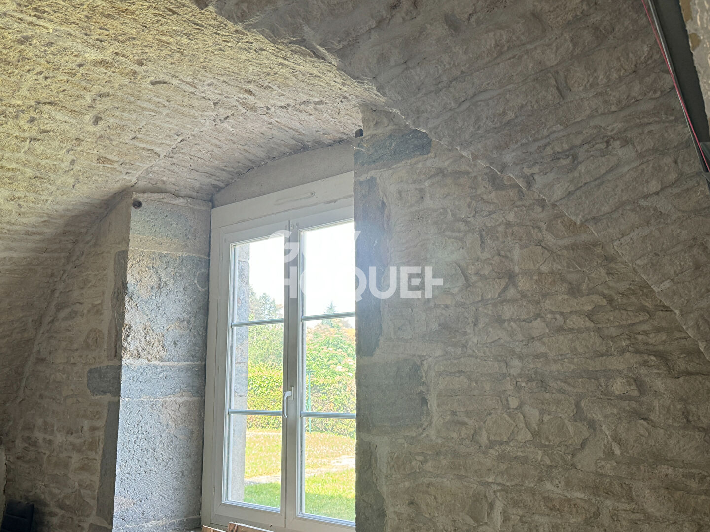 Appartement Evans avec jardin et pierres