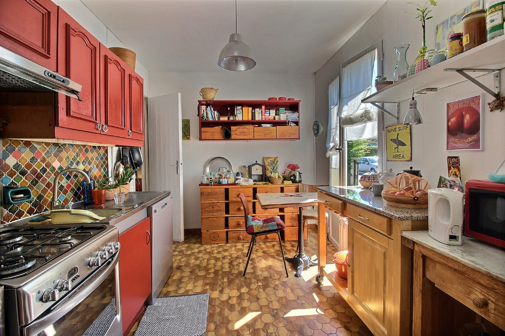 Maison 5 pièces de 100 m² à vendre à LEOGNAN (33850).