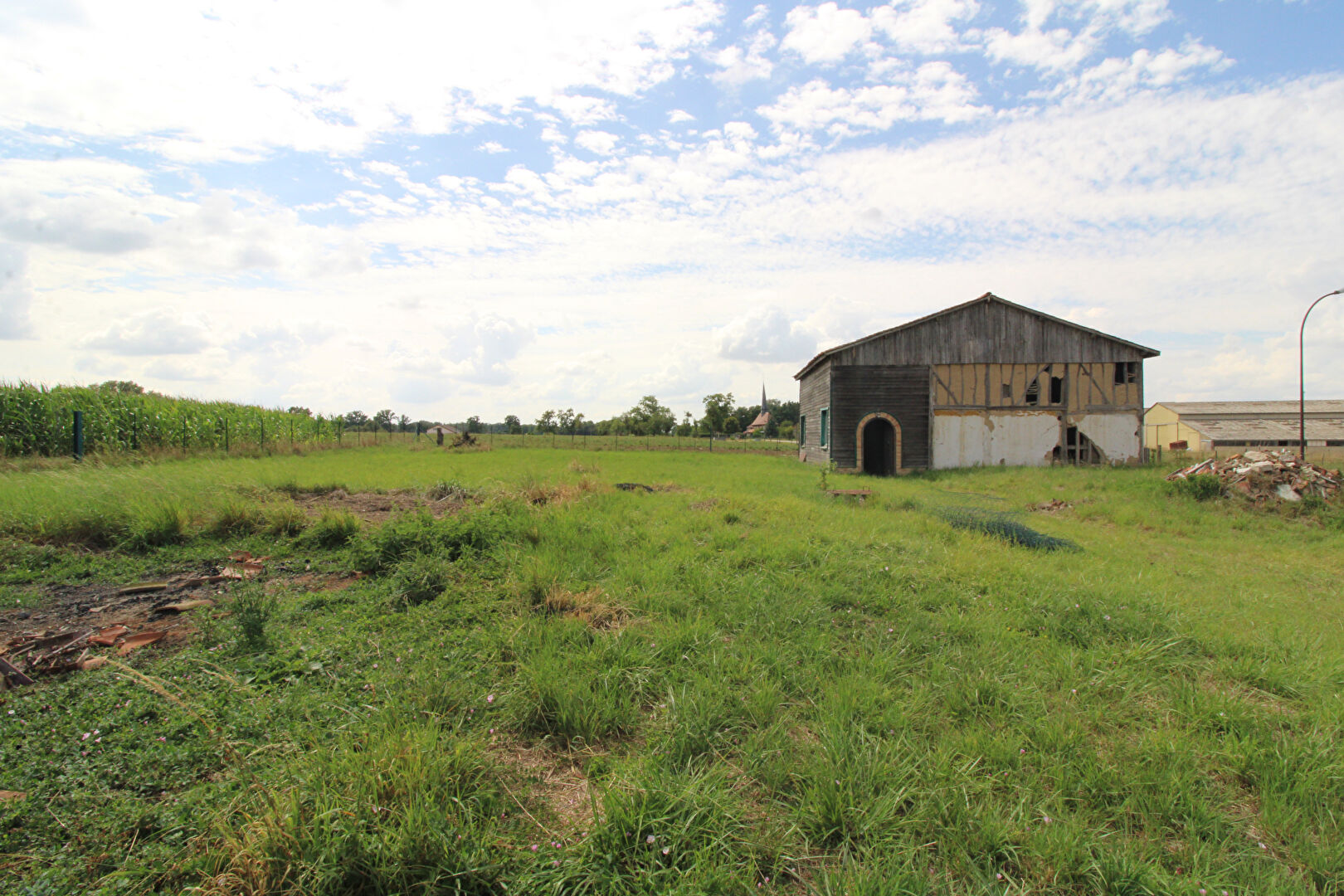 Photo Grange avec terrain constructible à Bailly-le-Franc image 2/5