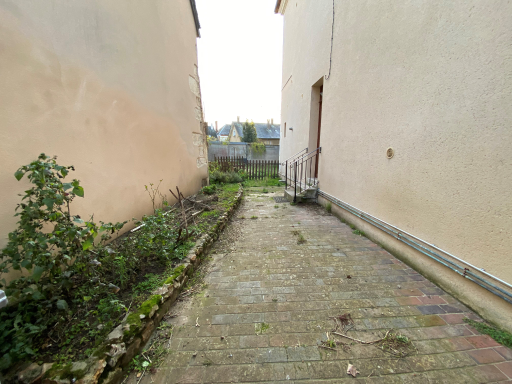 Photo Appartement avec courette - T3 56 m² - BROU Centre image 4/6