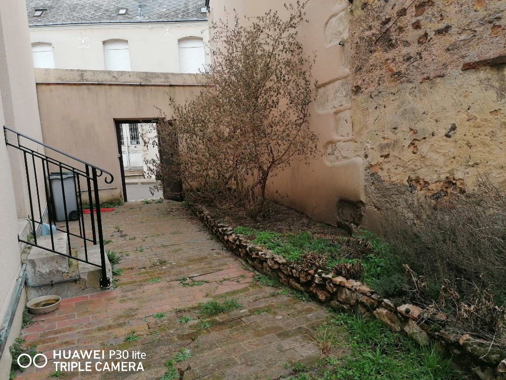 Photo Appartement avec courette - T3 56 m² - BROU Centre image 5/6