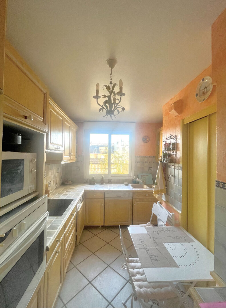 Photo Courbevoie - Saint Denis - 3 pièces 58.4m² terrasse image 3/6