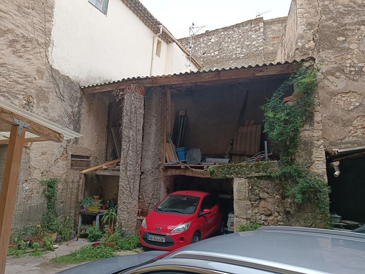 Appartement duplex avec cour, garage et cave