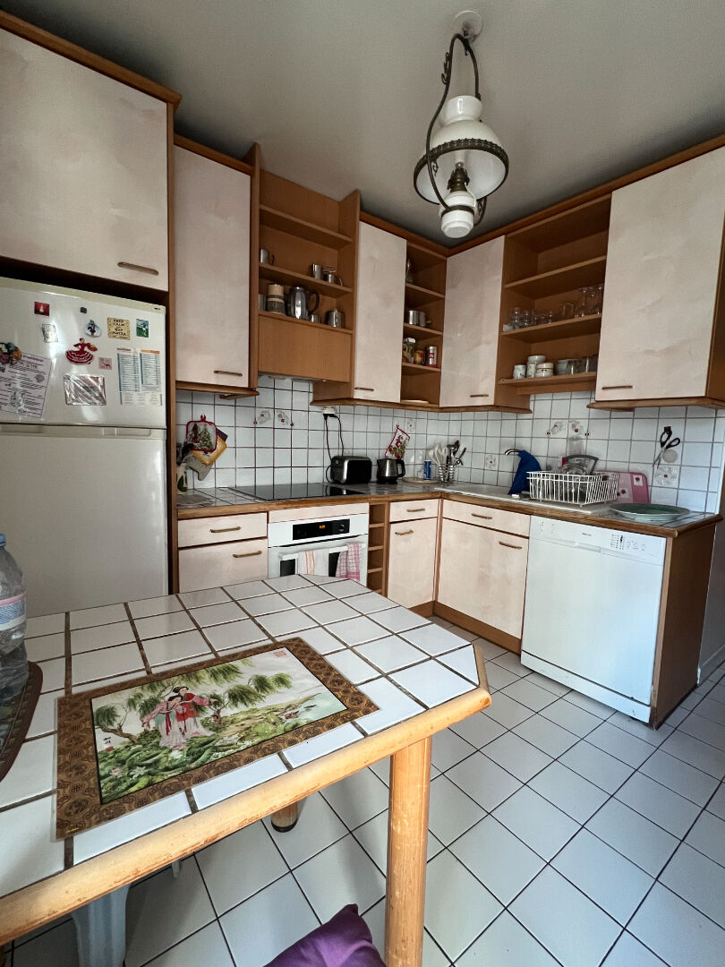 Photo PARIS 15 F. FAURE Appartement  4 pièces 92 m2, loggias image 4/6