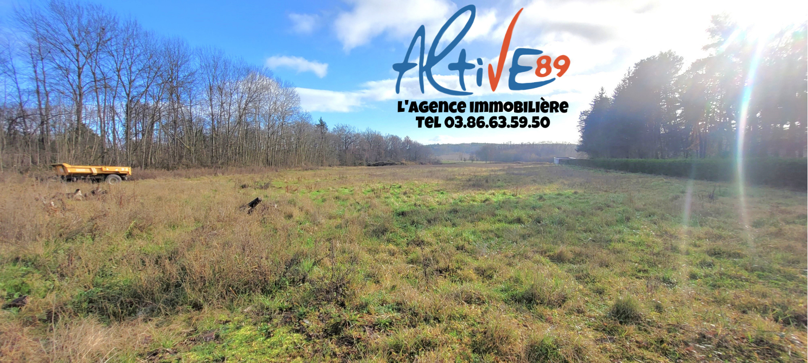 Photo Terrain 9km d'Auxerre, à Charbuy de 1000m² avec branchement au tout à égout, possibilité d'acquérir plus de surface si besoin image 1/1