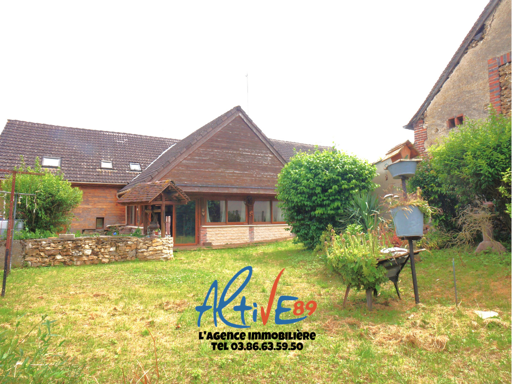 Photo Maison secteur La Celle Saint Cyr 263m² habitable sur jardin de 670m² image 1/6