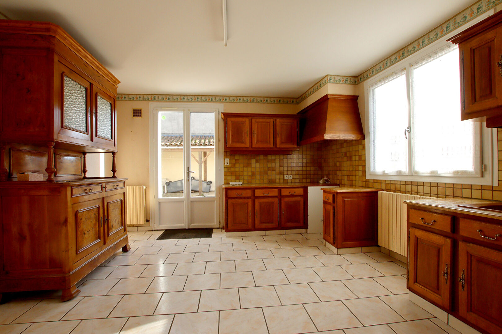 Photo Maison 3 chambres avec 2 garages et terrasse dans le bourg de  La Crèche image 4/6