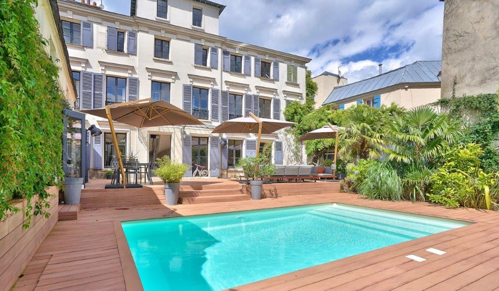 Exceptionnelle demeure de famille en plein coeur de ville