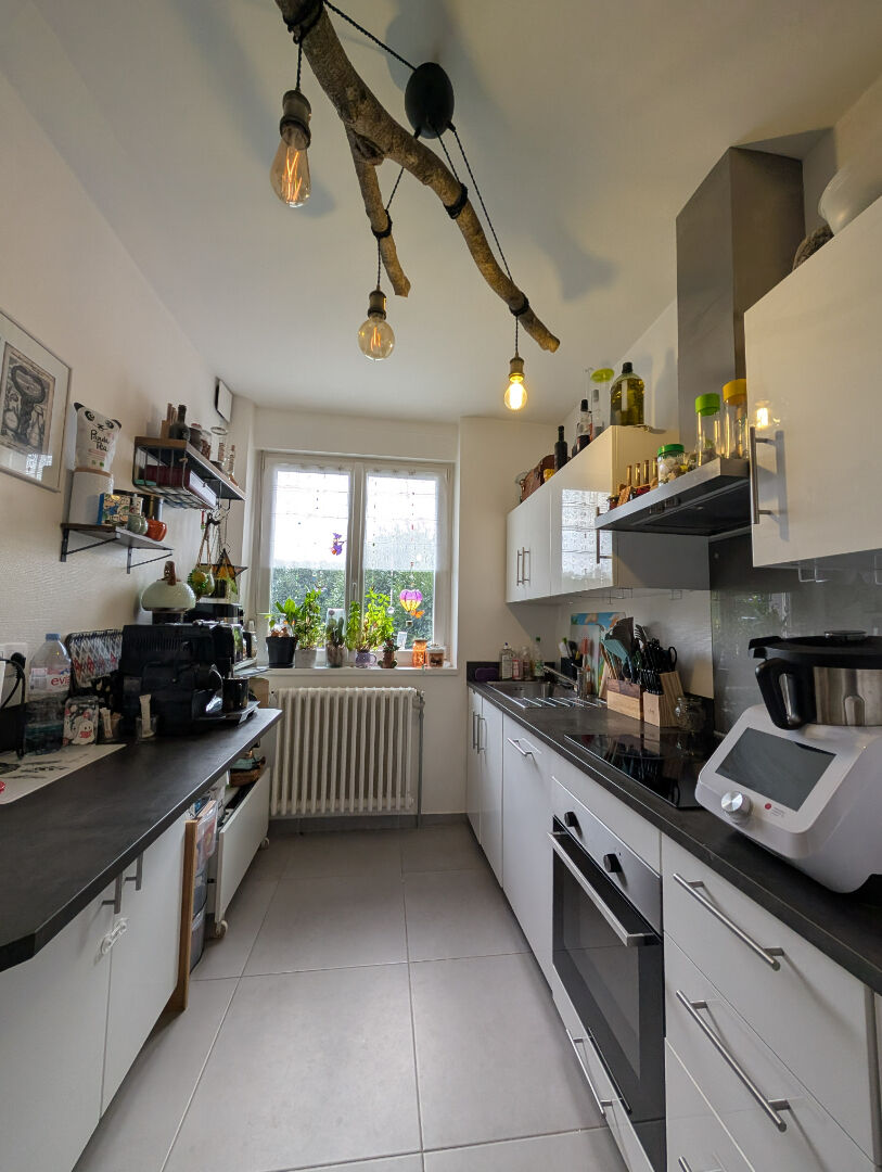 Photo Maison 5 pièces 77 m² image 2/6