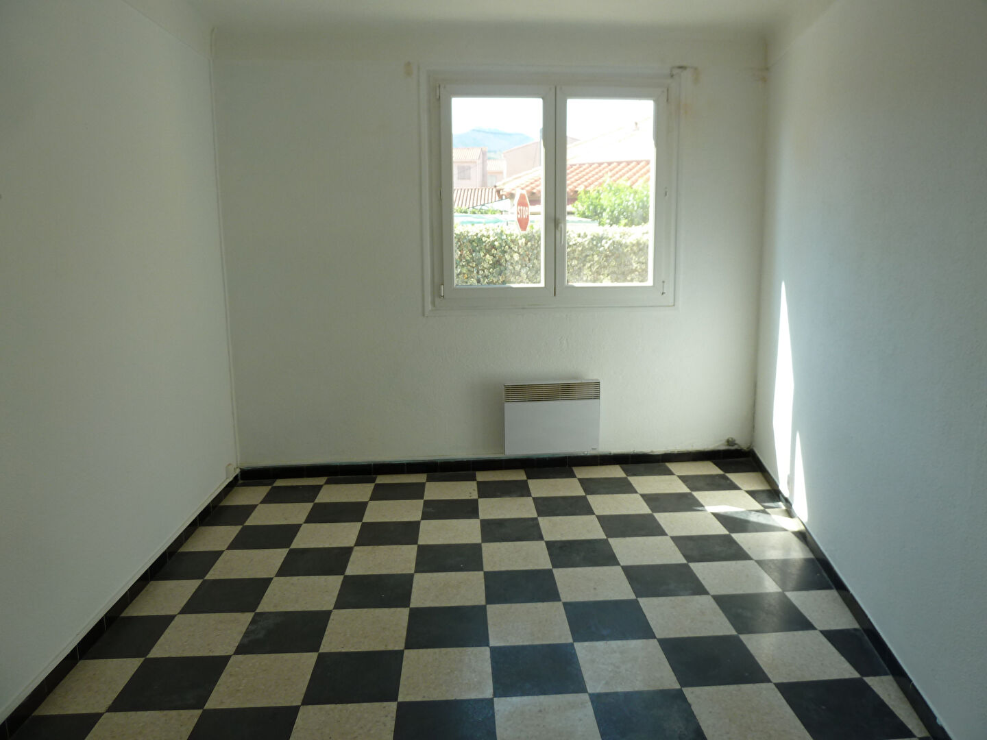 Photo Agréable Petite Maison de plain-pied avec Garage image 6/6