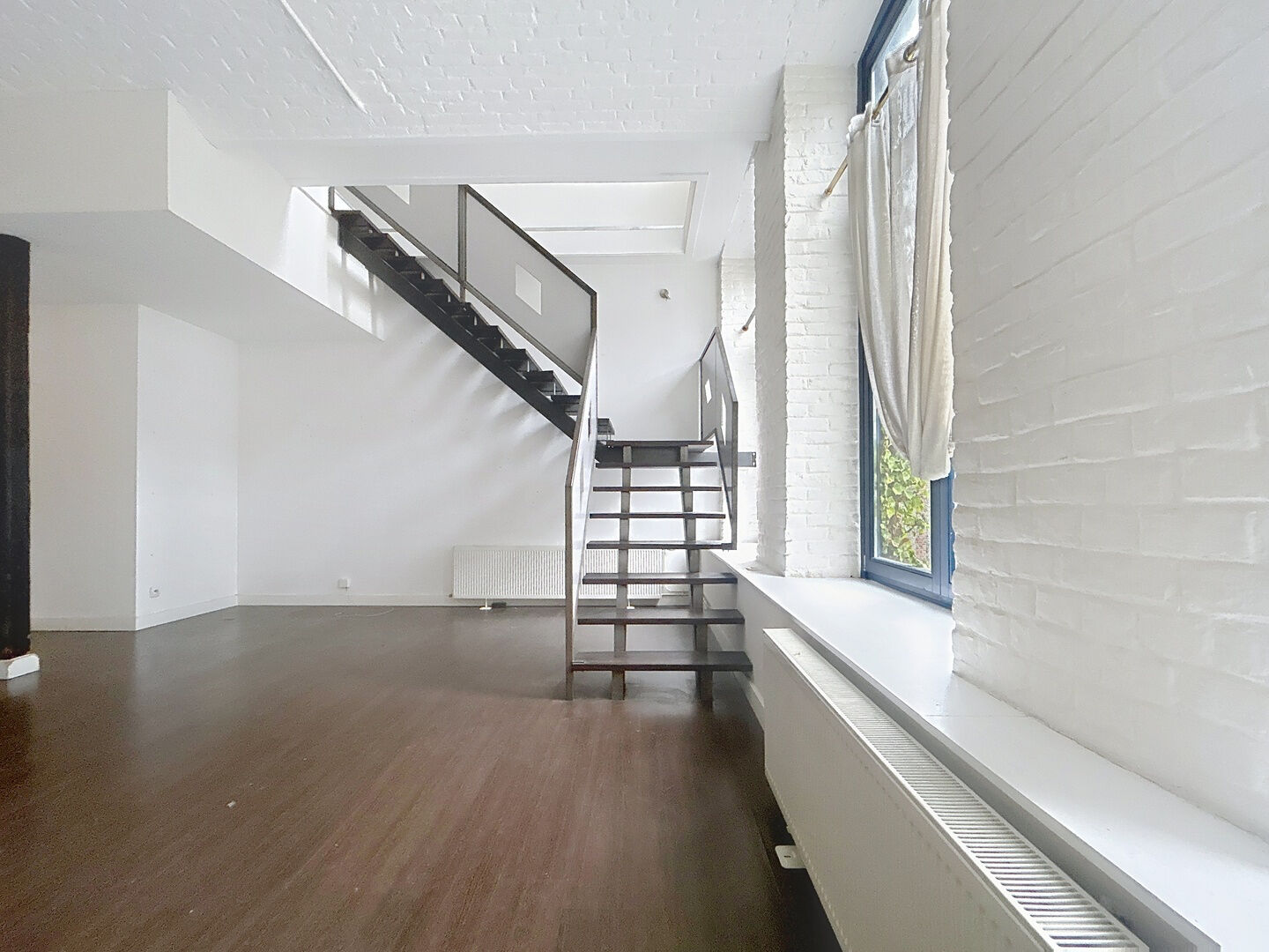 T4 en duplex avec terrasse et 2 places de parking