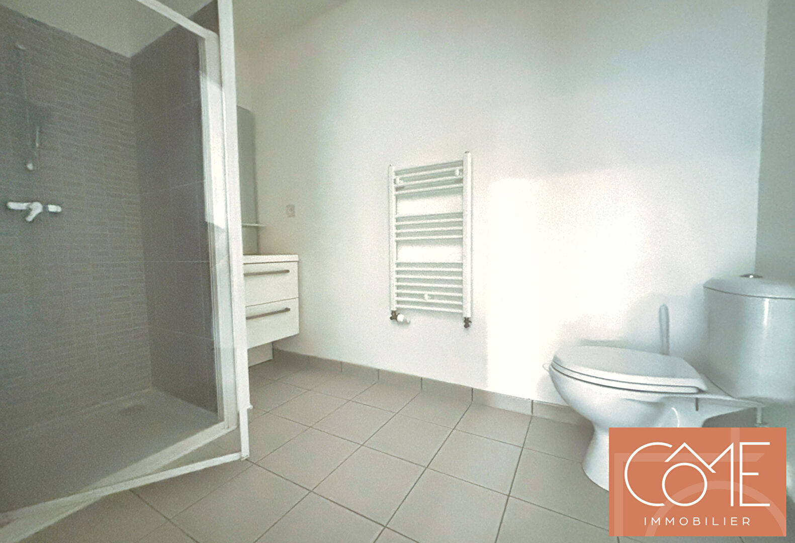 Photo - A VENDRE APPARTEMENT RECENT TYPE 2 DE 46 m² ENV. - IMMEUBLE AVEC ASCENSEUR - CELLIER ET PLACE DE PARKING EN SOUS SOL. - QUARTIER RUE DE SAINT-MALO / NORD SAINT-MARTIN -  35000 RENNES NORD image 5/6