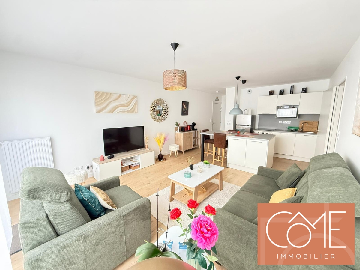 Photo A VENDRE APPARTEMENT T3 - 66M² - BALCON - PARKING EN SOUS-SOL - QUARTIER PARAME - 35400 SAINT MALO image 3/6