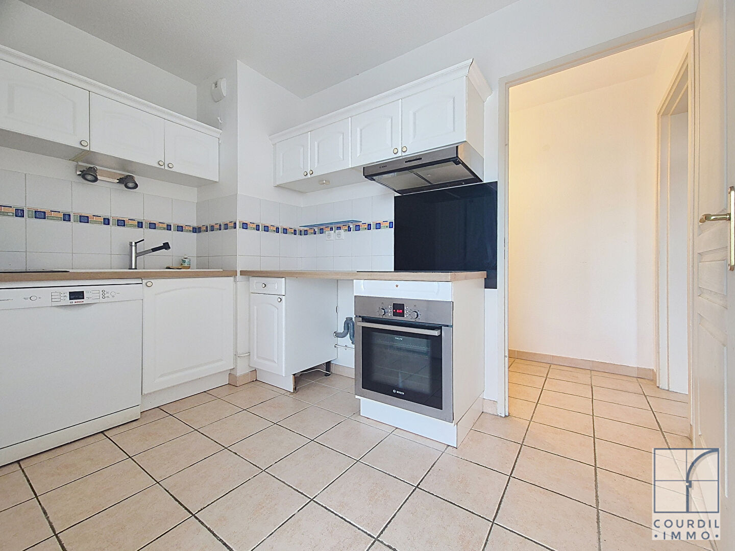 Photo Appartement 4 pièces de 81,66 m² - Terrasse - Garage - Parkings image 5/6