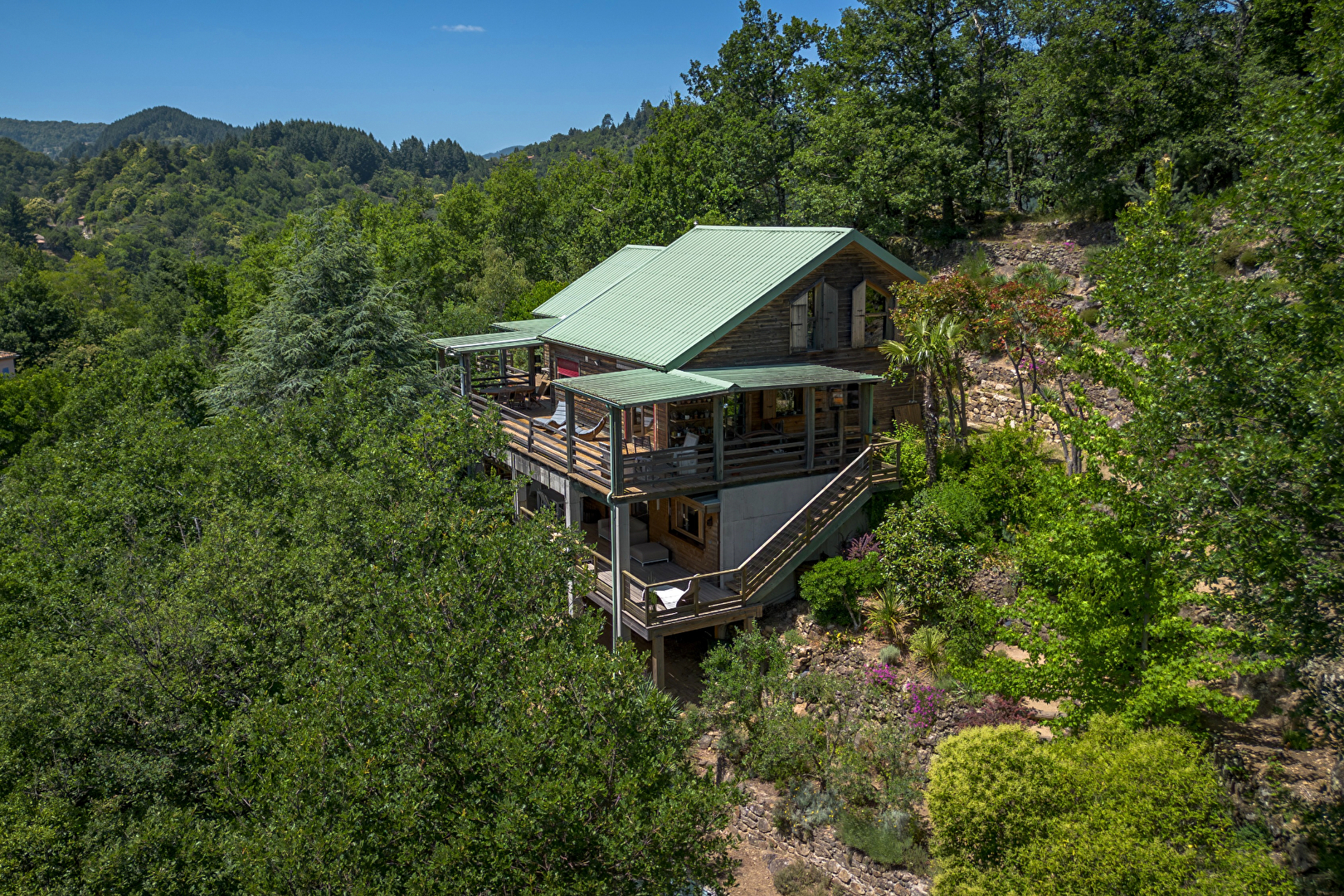 Maison en ossature bois avec vue sur la nature