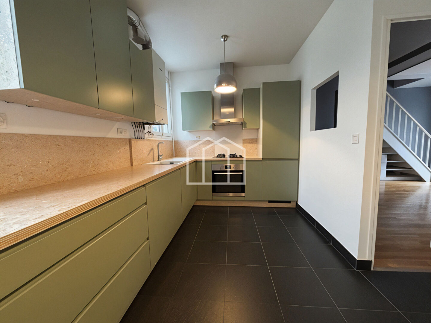 Photo Charmant duplex traversant de 85.69m² avec 3 chambres image 5/6