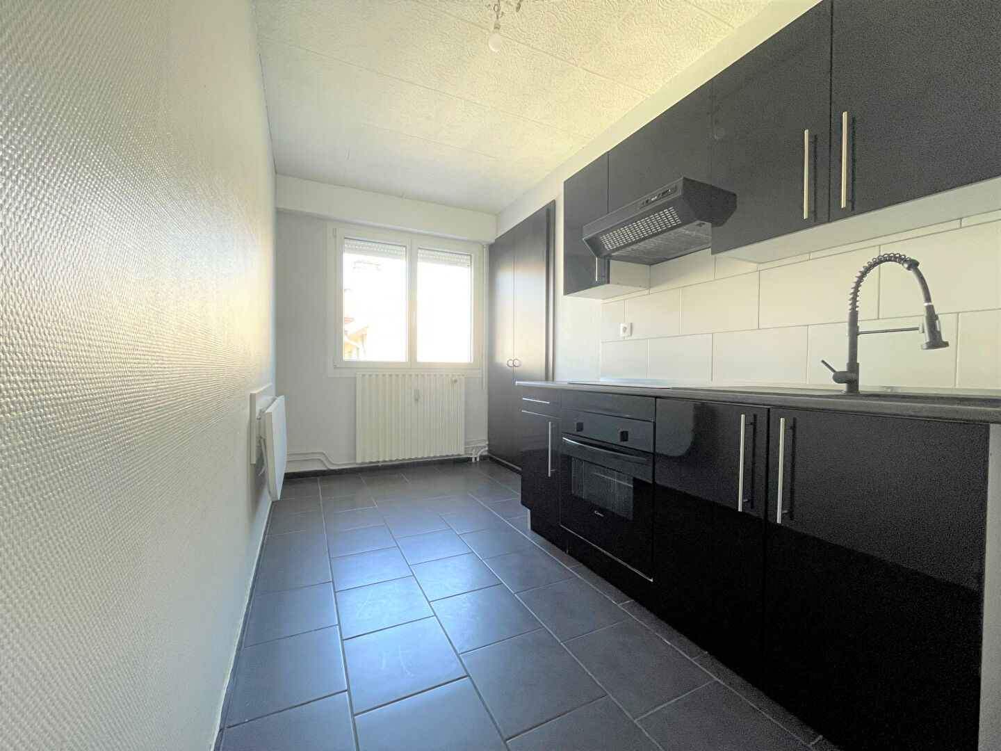 Photo EPINAL - APPARTEMENT F2 - 51.97 m² image 2/6