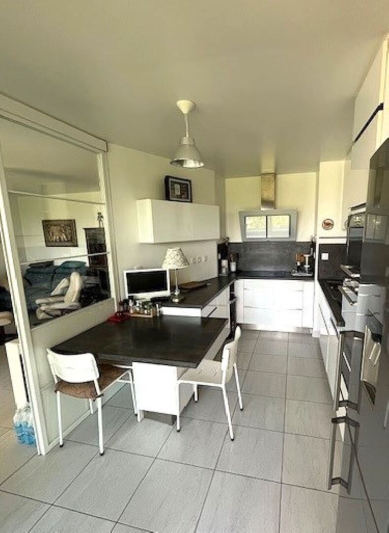 Photo NANTES - ILE DE NANTES - Appartement 4 pièce(s) 82 m2 - Terrasse - Garage image 3/4