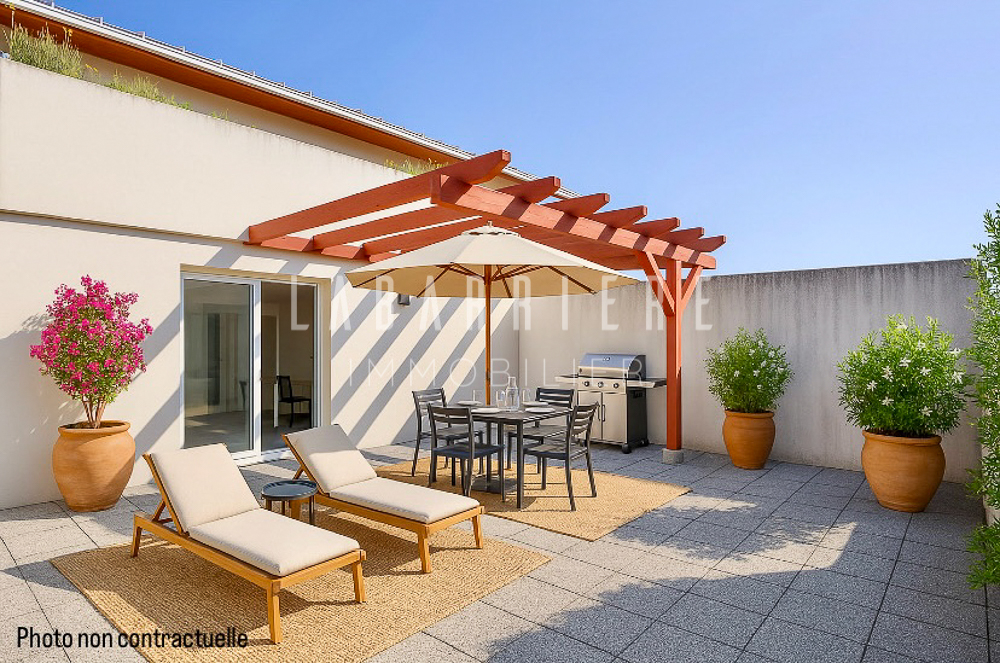 Photo T3 de 69 m² - Terrasse 39 m² , garage & cave. image 6/6