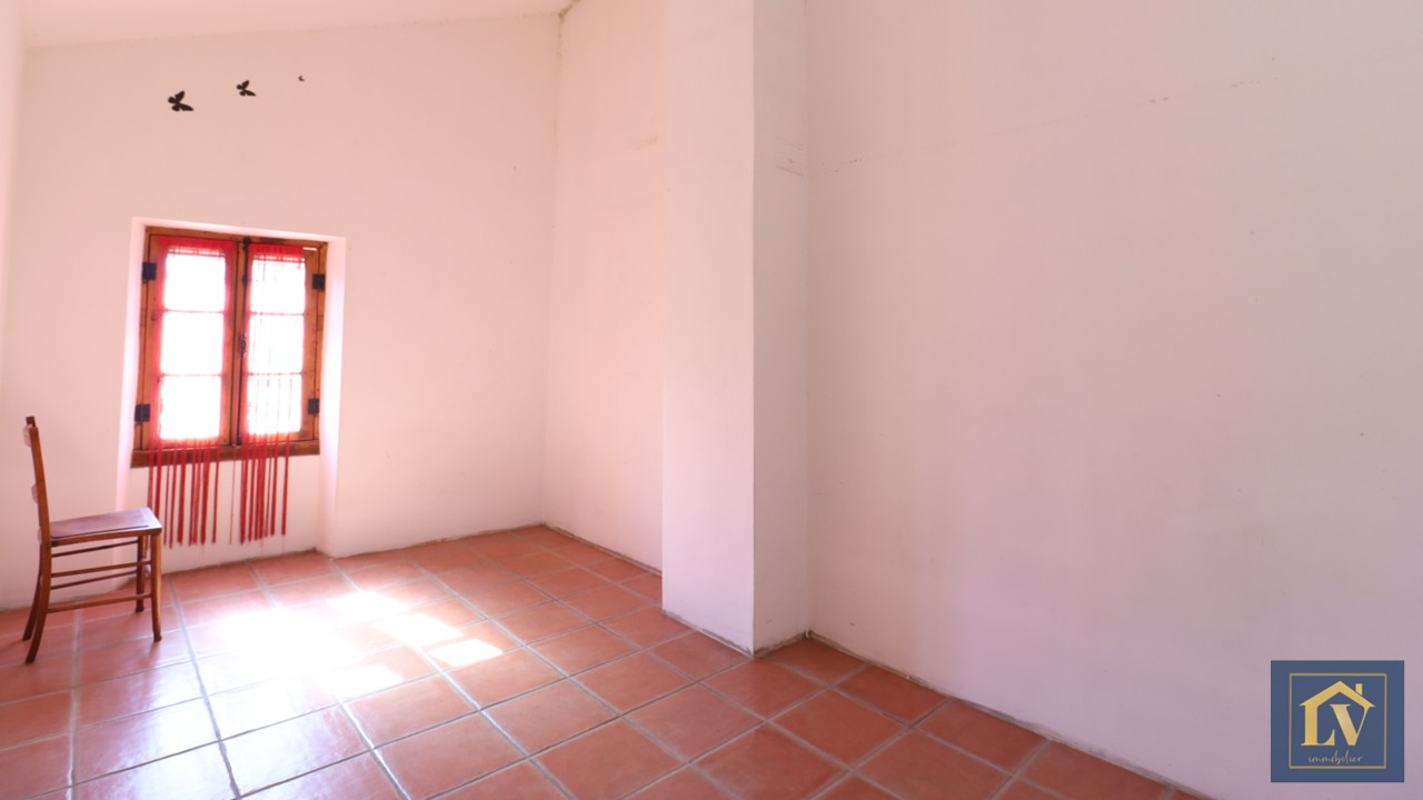 Photo A vendre maison de village rénovée en deux faces aves garage image 6/6