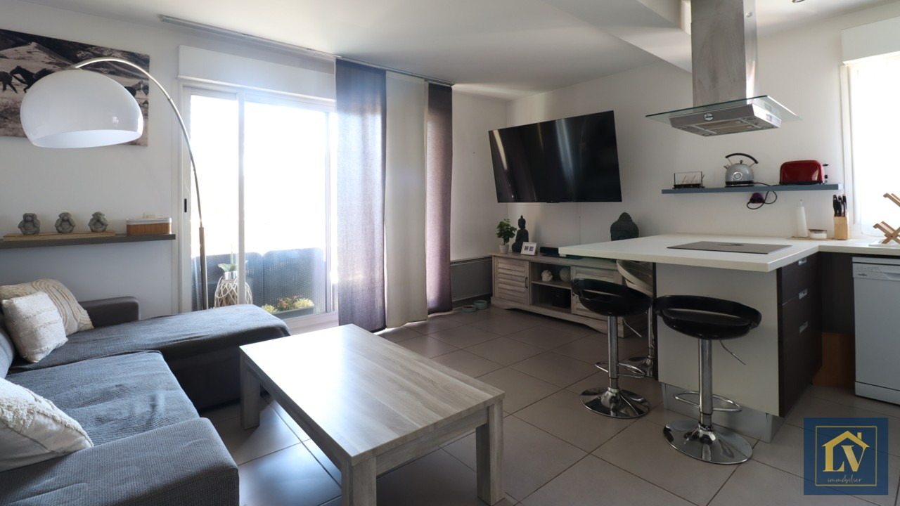 Photo A louer appartement 2 pièces avec terrasse et place de parking image 2/6