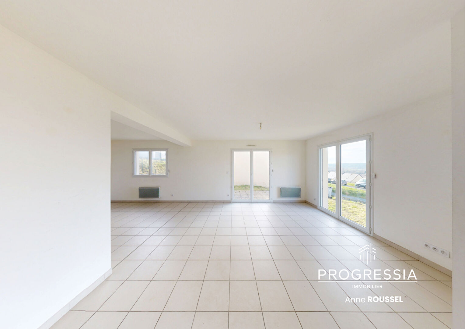 Progressia Immobilier - LE TRAIT - Maison traditionnelle de 93 m² avec jardin et garage