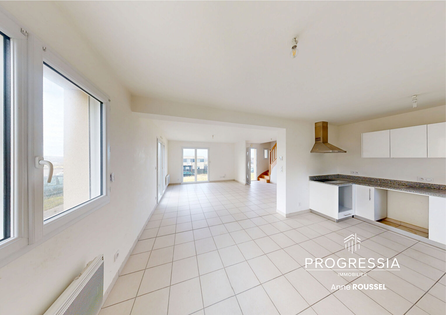 Progressia Immobilier - LE TRAIT - Maison traditionnelle de 93 m² avec jardin et garage