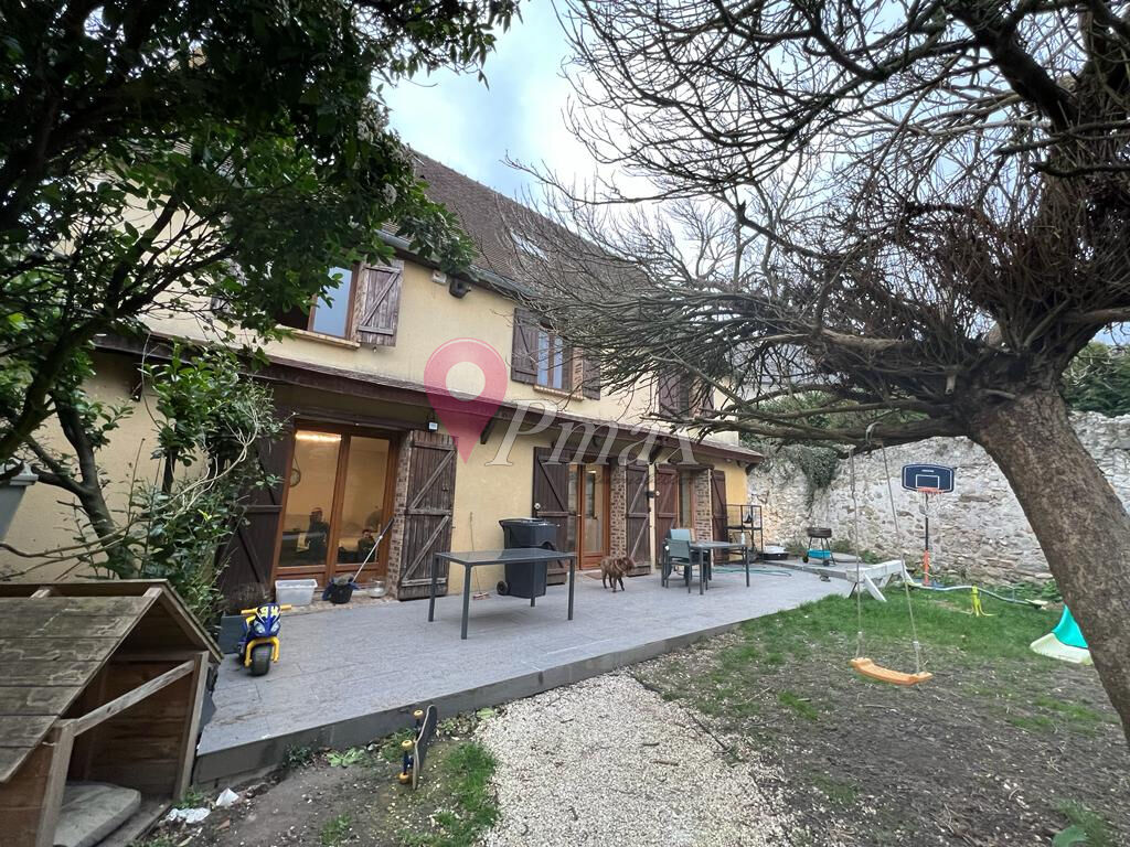 Photo Maison Eve 6 pièce(s) 140 m2 image 1/6