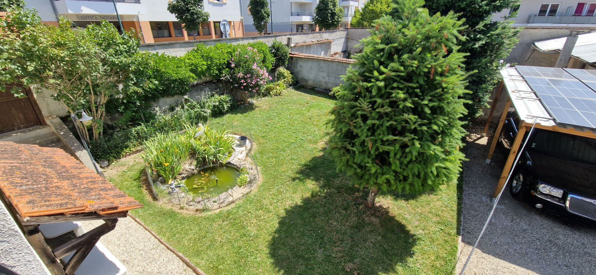 Photo Maison de ville 5 pièces de 109 m2 avec terrain de 466 m2 et de nombreuses dépendances image 5/6