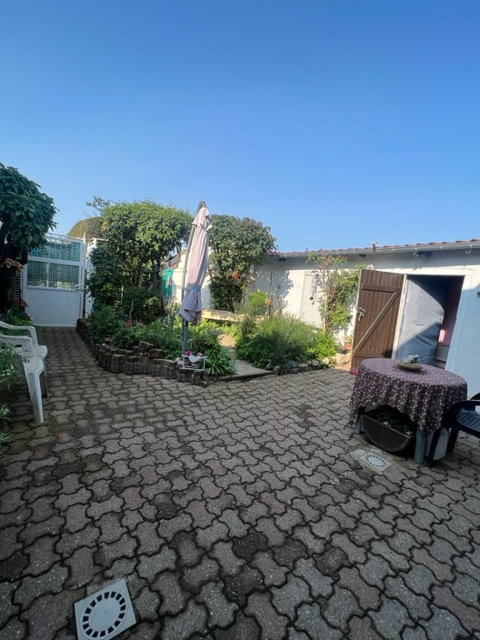Photo Maison mitoyenne de 170m² avec garage et jardin de 5.97 ares image 3/6