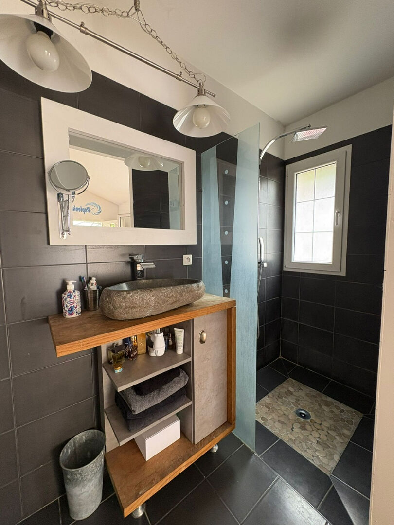 Photo Maison familiale idéalement située - Agencement fonctionnel et terrain de plus de 1500 m² ! image 4/6