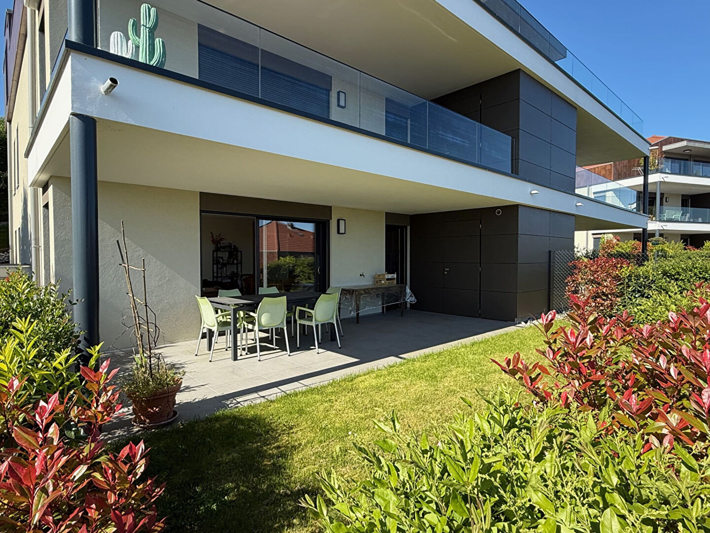 Photo NEUVECELLE  - Appartement 3 pièces de 78 m² avec jardin et vue lac image 2/6