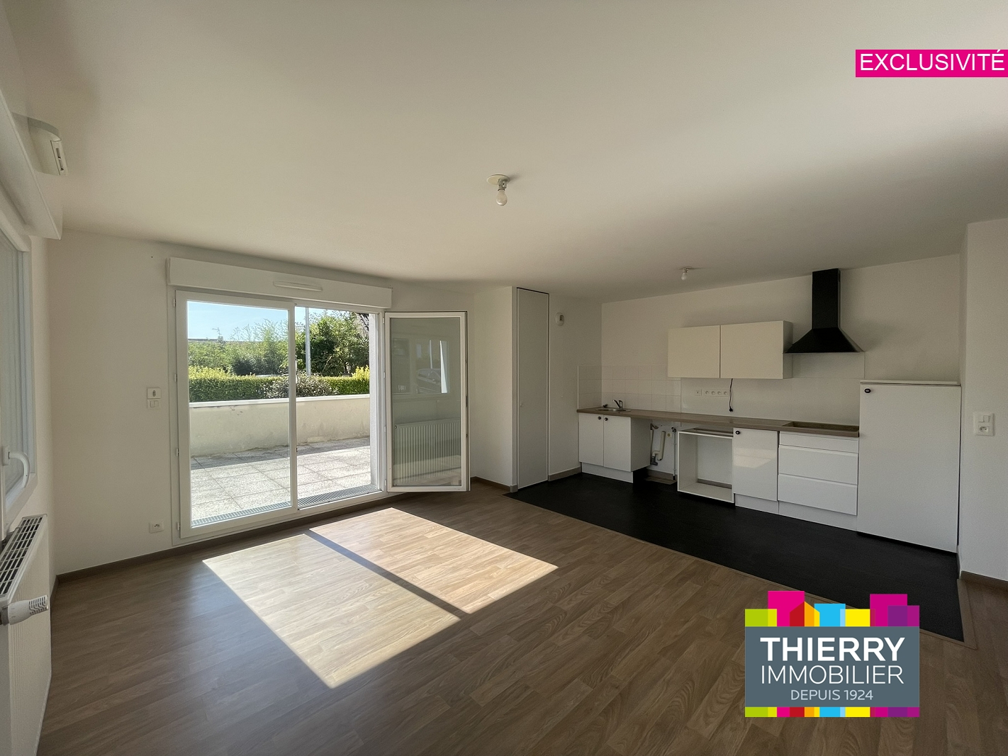 T3 + TERRASSE + JARDIN + 2 PARKINGS