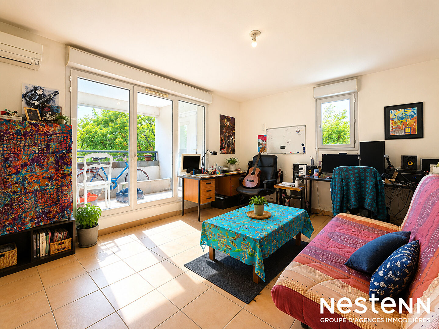 Appartement T2 de 47m² au 1er étage avec ascenseur, terrasse et garage à vendre au centre-ville de Castanet-Tolosan