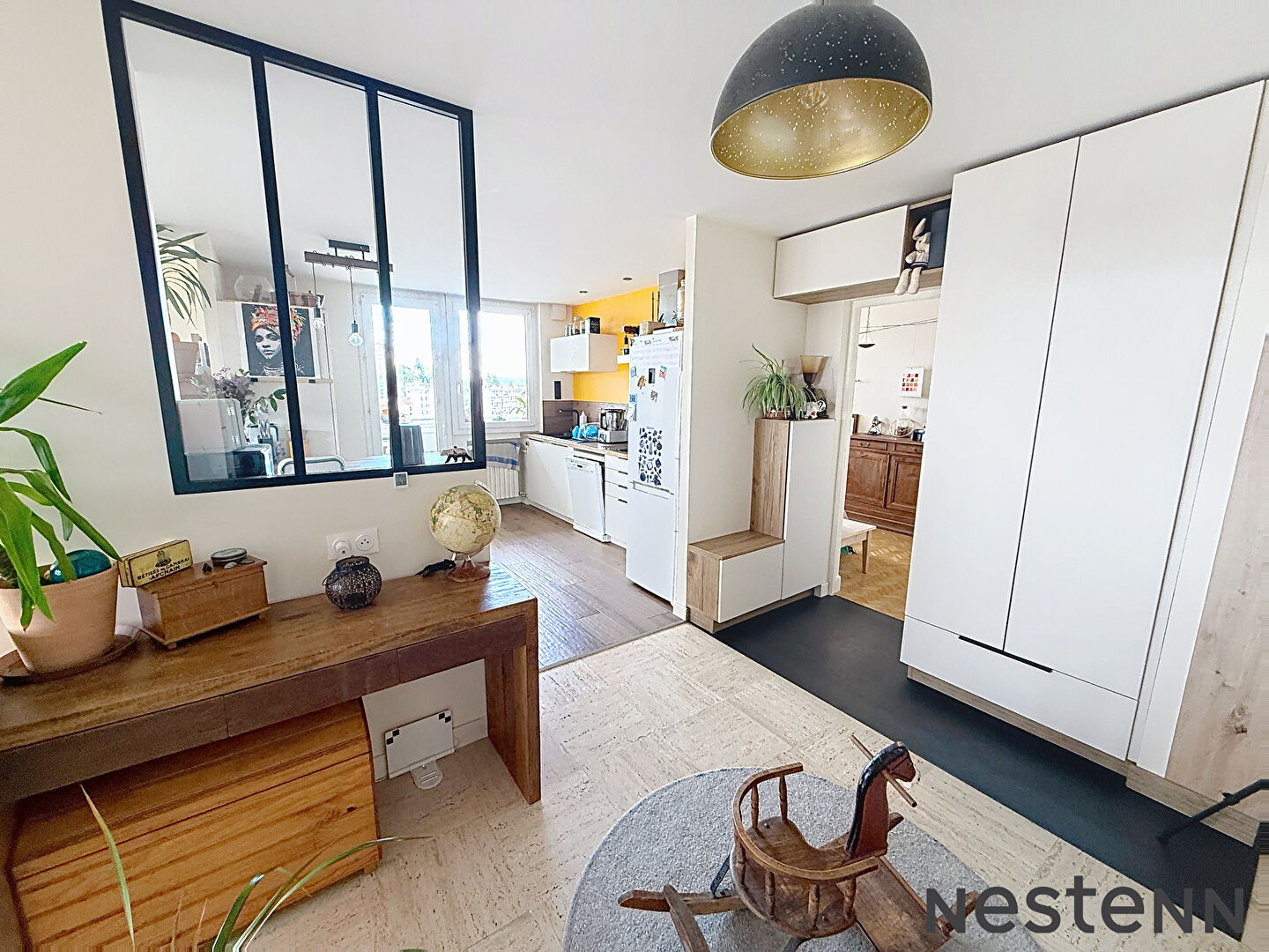 EXCLUSIVITÉ Coup de coeur - Appartement rénové avec soin avec garage et 2 places de parking privatives