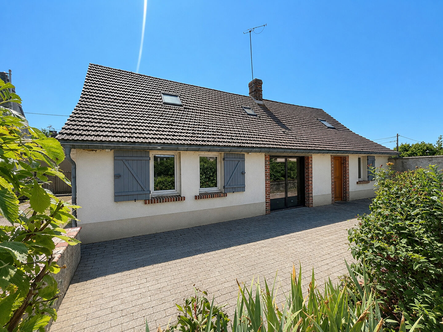 Maison familiale avec vie de plain-pied, grand jardin.