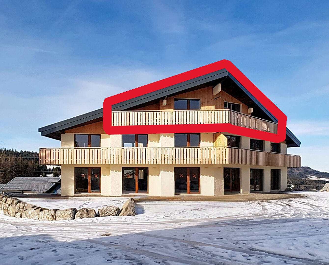 Property in Haute-Savoie features stunning mountain views from the terrace, showcasing the beauty of Auvergne-Rhône-Alpes.